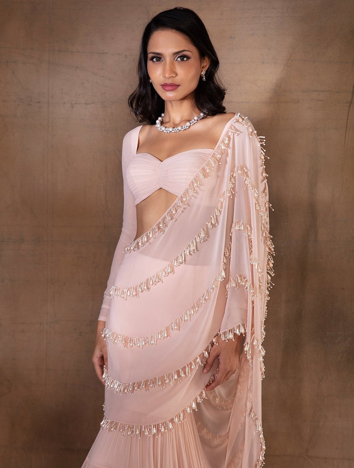 Instagram post with the caption: ✨ Effortless elegance in every drape ✨
Blush tones, soft shi...