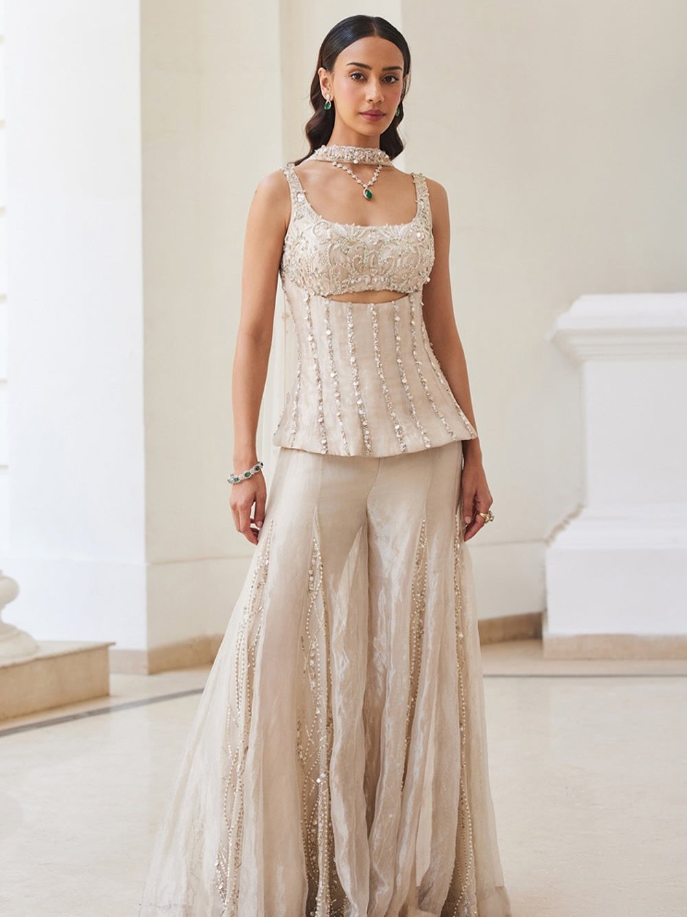 Instagram post with the caption: Effortless elegance in motion.
This soft gold Sanya Gulati e...