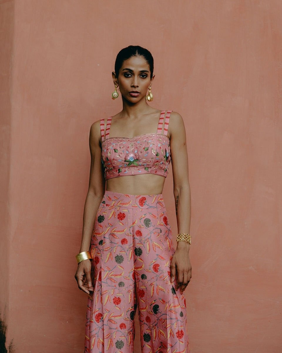 Instagram post with the caption: A moment for the modern muse.
This blush pink co-ord set is ...